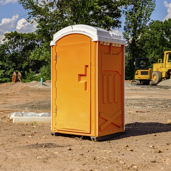 how often are the portable restrooms cleaned and serviced during a rental period in Breitung